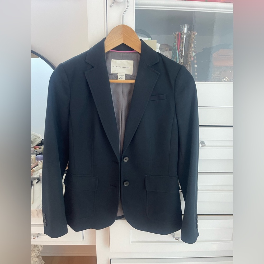 Banana Republic blazer black with pink strip inside like new.